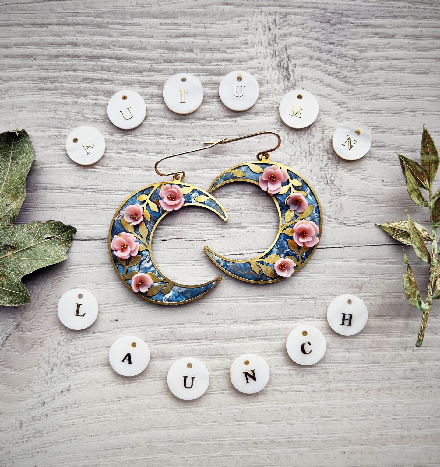 Gold floral moon earrings