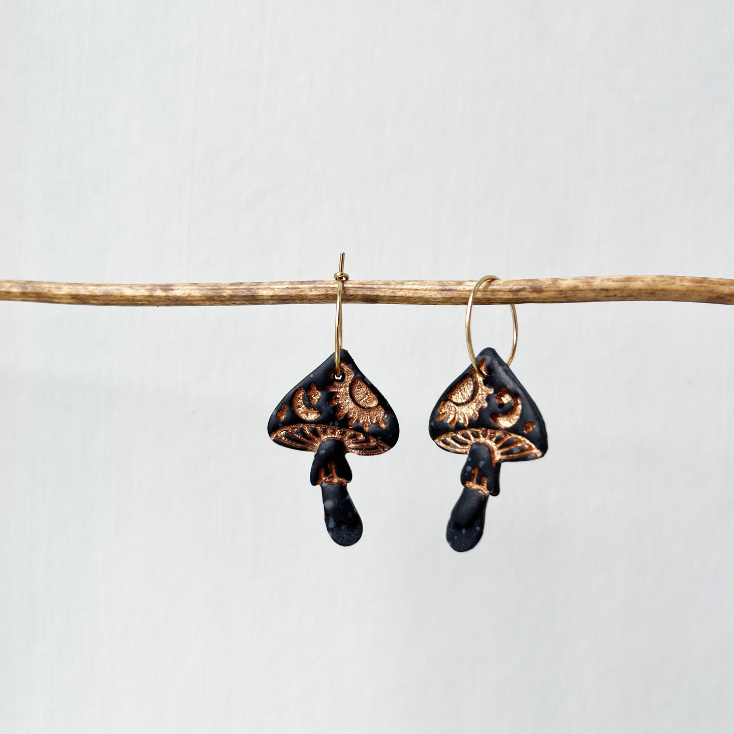 Black and gold celestial toadstool earrings
