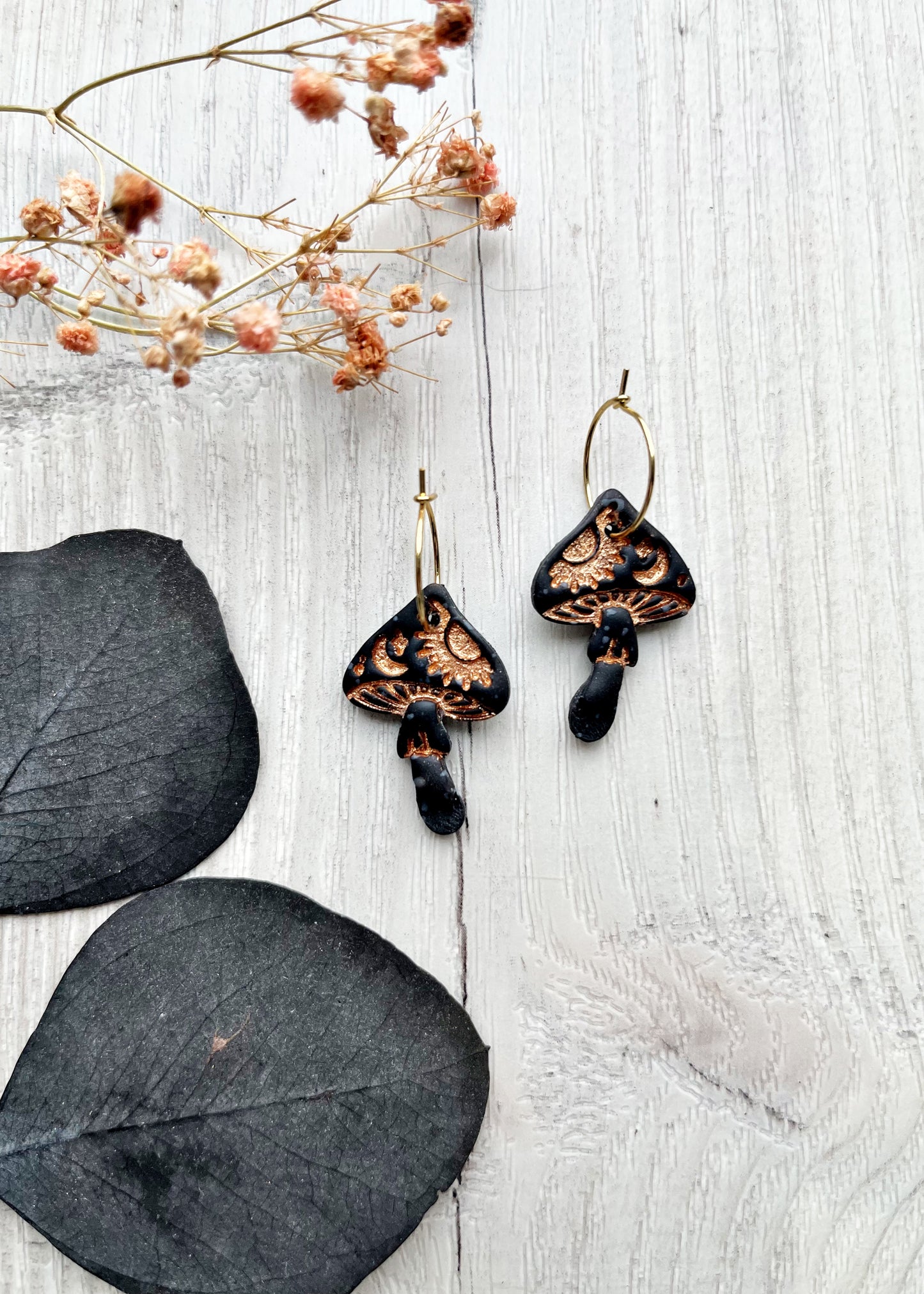Black and gold celestial toadstool earrings