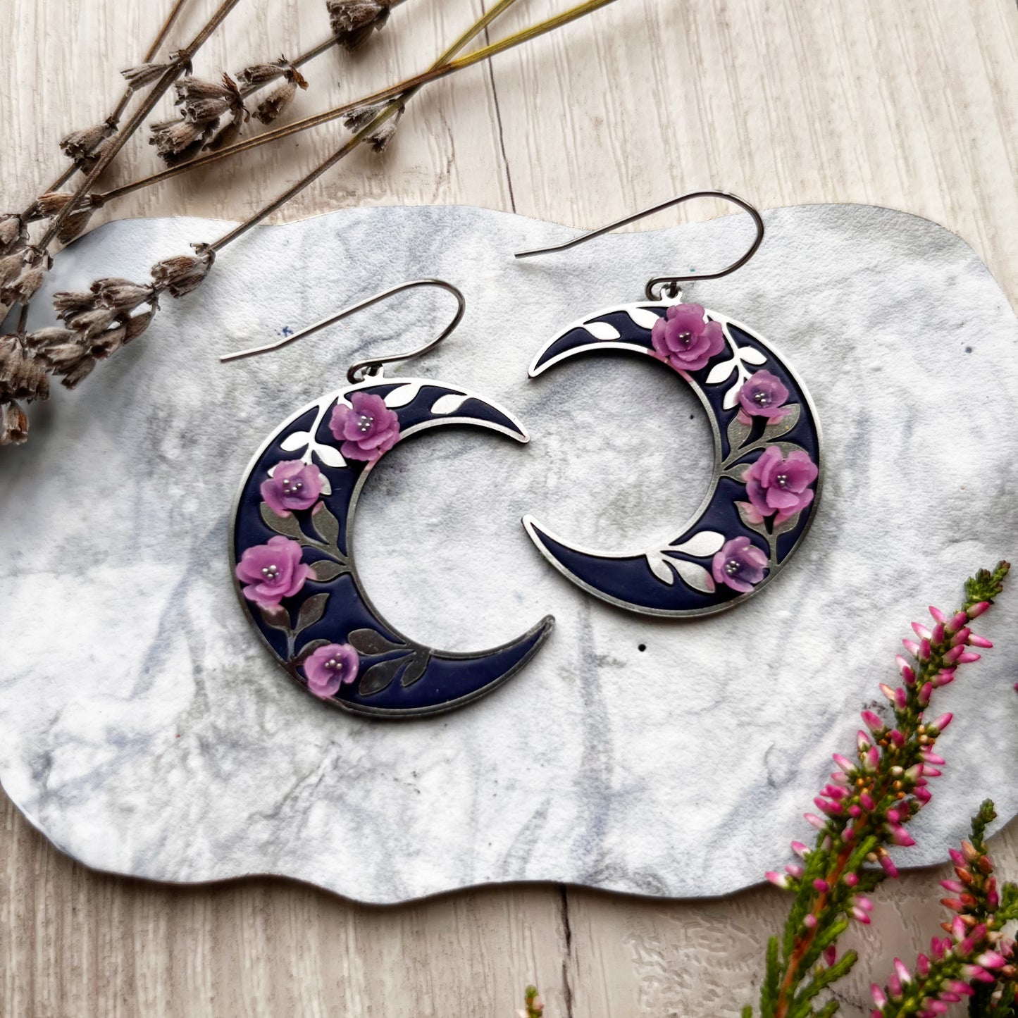 Silver floral moon earrings
