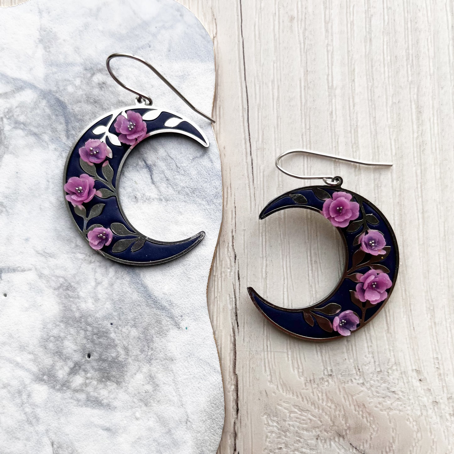 Silver floral moon earrings