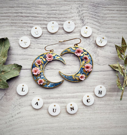 Gold floral moon earrings